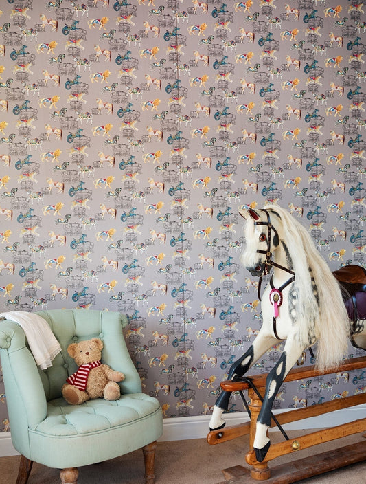 Carousel Wallpaper background with rocking horse and teddy bear on a pale green armchair